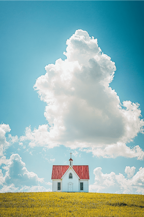 Una pequeña iglesia blanca con tejado rojo descansa sobre una colina cubierta de hierba, ofreciendo consuelo y oraciones por la ansiedad bajo una gran nube esponjosa en el claro cielo azul.