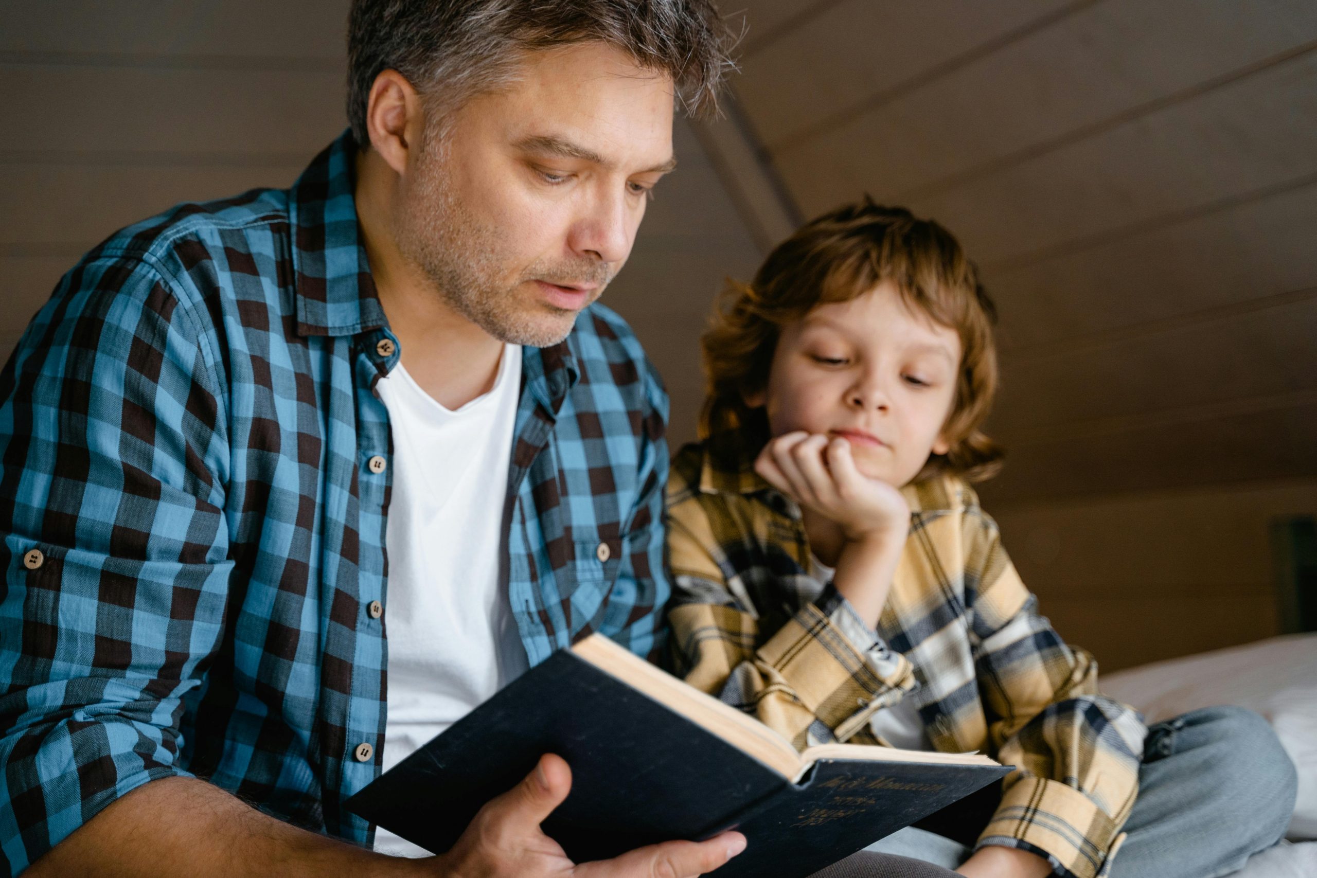 A father reading with his son