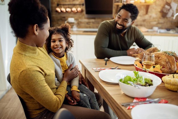 A family enjoying a meal together to show companionship as a factor of what constitutes marriage according to the Bible.