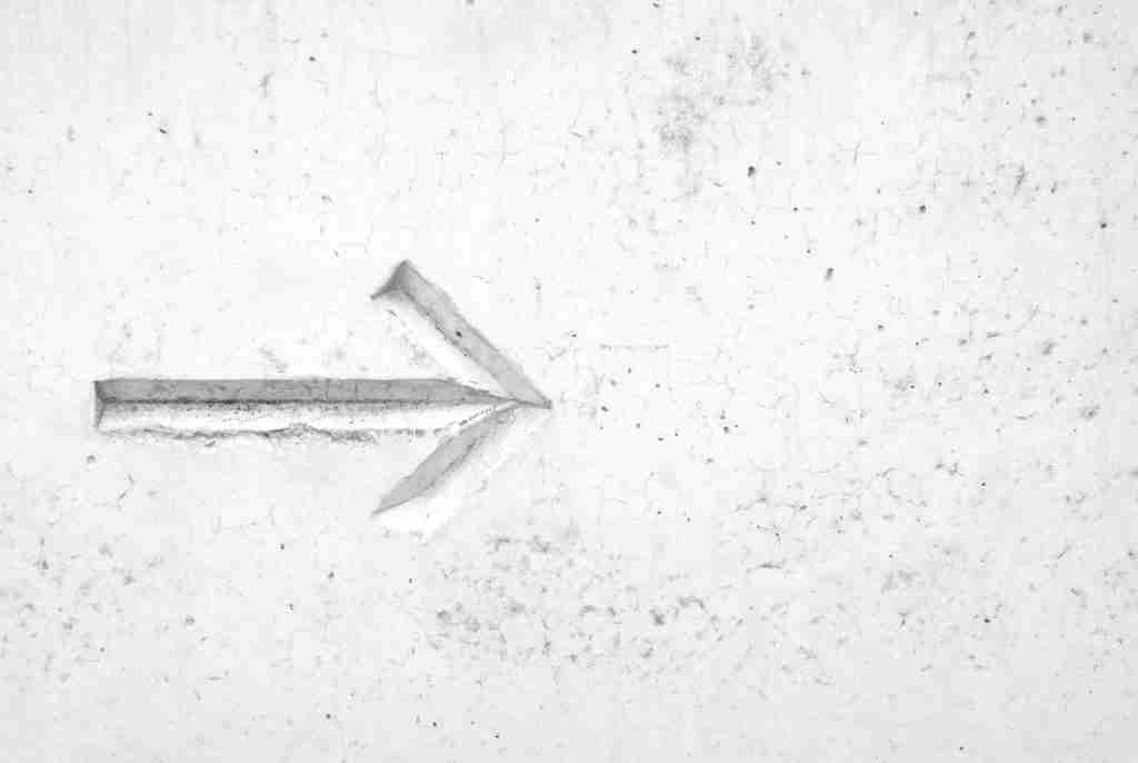 arrow in cement, showing leadership for church leaders