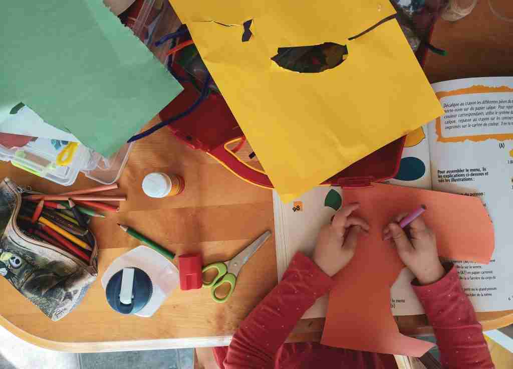 kids doing a craft, perhaps in sunday school