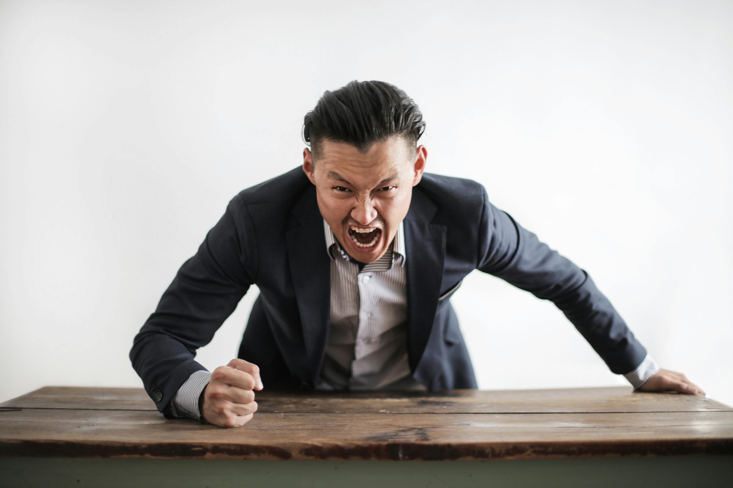 A man raising his voice