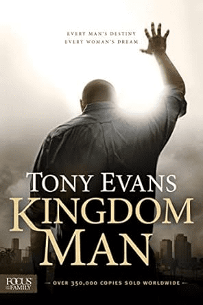 Silhouette of a man with arms raised, sunlight behind him. Text: "Tony Evans Kingdom Man: One of the Best Bible Studies for Men.