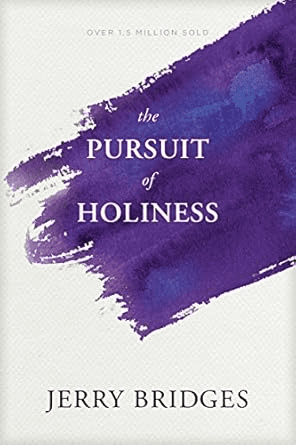 Book cover of "The Pursuit of Holiness" by Jerry Bridges, featuring a purple brushstroke design, ideal for those seeking the best Bible studies for men.