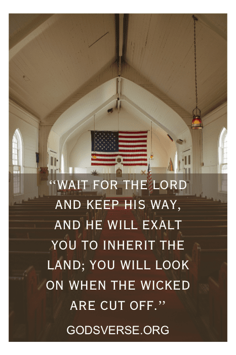 Interior of a church with an American flag, displaying Bible verses about waiting on the Lord, from godsverse.org.