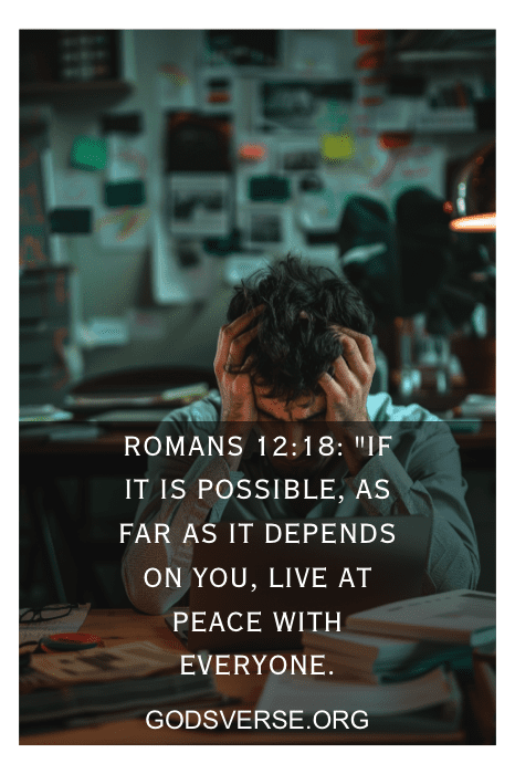 Person sitting at cluttered desk with head in hands; text on image reads "Romans 12:18." A quote about living at peace follows, serving as one of the Bible Verses for Stress at Work.