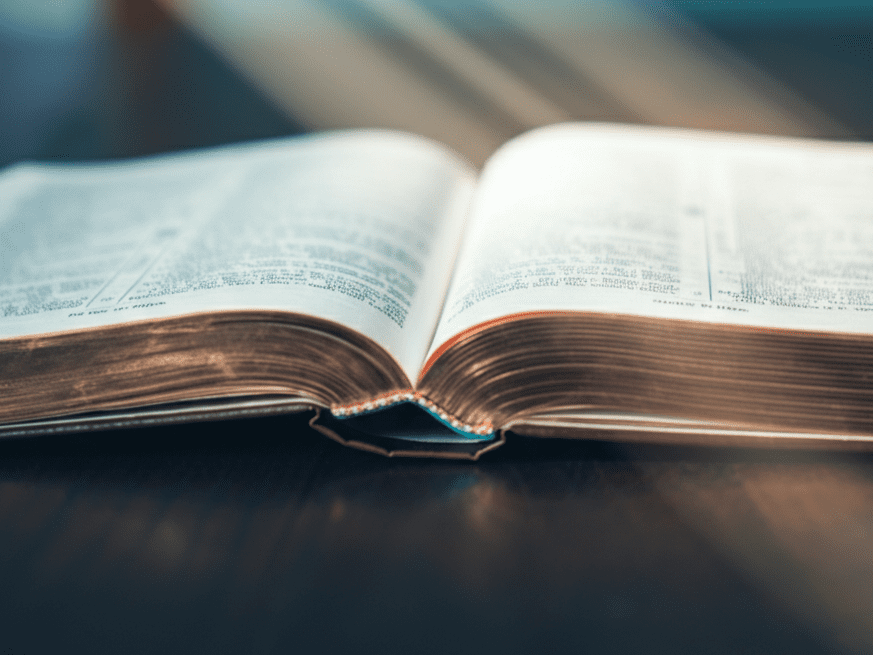 Bible verses from parents to son — open Bible with warm light